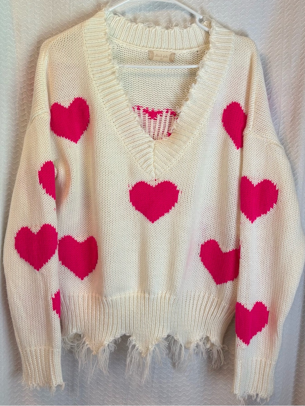 Altar’d State Cream And Hot Pink Hearts Distressed V-Neck Oversized Sweater.  XS